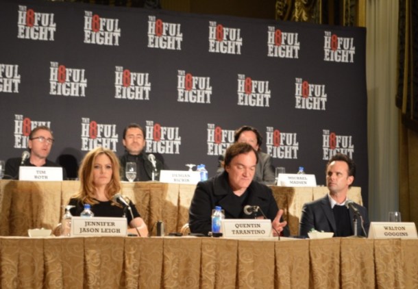 Tim Roth, Jennifer Jason Leigh, Demian Bichir, Kurt Russell, Quentin Tarantino, Michael Madsen and Walton Goggins at the New York Press Conference for "The Hateful Eight." Photo copyright 2015 Jay S. Jacobs.