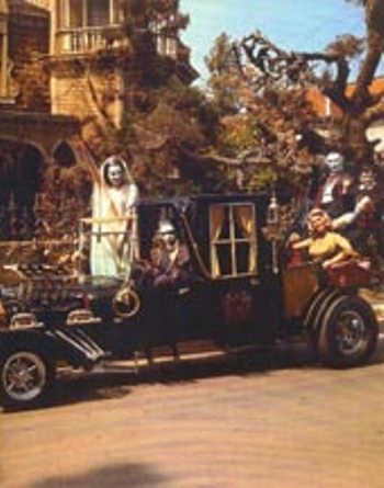 The Munsters in the Dragula Munster Mobile.