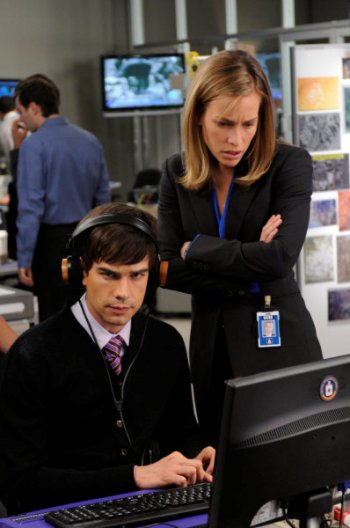 Chris Gorham and Piper Perabo in "Covert Affairs."