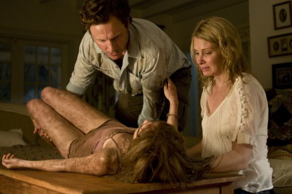 Tony Goldwyn, Sara Paxton and Monica Potter in "The Last House on the Left."