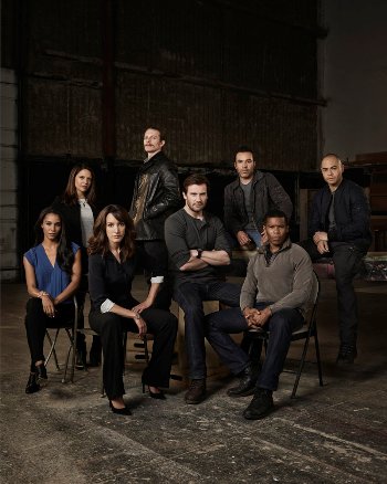 TAKEN -- Season: 1 -- Pictured: (l-r) Brooklyn Sudano as Asha, Monique Curnen as Becca Vlasik, Jennifer Beals as Christina Hart, James Landry Hebert as Rem, Clive Standen as Bryan Mills, Michael Irby as Scott, Gaius Charles as John, Jose Pablo Cantillo as Bernie -- (Photo by: Jeff Riedel/NBC)